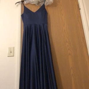 A line navy blue dress with spaghetti straps, pockets, side slit